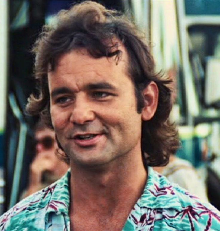 Bill Murray as Tripper in Meatballs, mid-sentence in a turquoise Hawaiian shirt